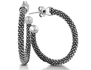If you are searching for a pair of everyday hoops, with a hint of flair, then look no further.  These classic silver earrings are light and durable.  The earrings are 1 inch in diameter.