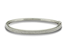 What could be more timelessly elegant than a diamond bangle bracelet?  This 1/2 carat diamond bangle contains 152 hand micropave set round brilliant diamonds, each firing like the fine gem they are.  Its so hard to find fine diamond bracelets these days, so don''t miss out.  Diamond content is 1/2 carat in H/I color and I1 clarity.  Three star diamonds.