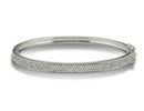 What could be more timelessly elegant than a diamond bangle bracelet?  This 1 carat diamond bangle contains 200 hand micropave set round brilliant diamonds, each firing like the fine gem they are.  Its so hard to find fine diamond bracelets these days, so don''t miss out.  Diamond content is 1/2 carat in H/I color and I1 clarity.  Three star diamonds.