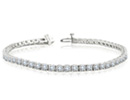 This 14 karat white gold 8 carat diamond line tennis bracelet has a round based setting that is comfortable to wear and quite classic.  Definitely a very fine diamond bracelet basic.  She will love the fiery diamonds,  8 carats, J/K color, I1/I2 clarity.  Two star diamonds.