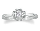 For the flower girl in all of us, this sterling silver flower shaped diamond promise ring is simply perfect! Diamond content is .07 carats in J/K color I2/I3 clarity.  One star diamond.