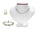 This stylish freshwater pearl set is perfect for the trendsetter in all of us.  Necklace has seven 11mm x 7mm pearls, bracelet has six, and the earrings have two for a total of 15 pearls!