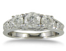 You don't have to break the bank to afford this beautiful three diamond plus engagement ring in 10 karat white gold.  Diamond content is 1 carat total weight with a 1/3 carat center in I/J color I2/I3 clarity.  One star diamonds.