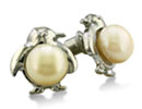 These unique penguin shaped pearl earrings are unlike anything you've seen before!  With two 8mm freshwater pearls, these earrings are perfect for the animal lover in all of us.