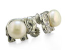 These unique elephant shaped pearl earrings are unlike anything you've seen before!  With two 8mm freshwater pearls, these earrings are perfect for the animal lover in all of us.