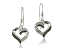 These Delicate and dainty black and white diamond heart earrings in sterling silver are perfect for everyday wear.  Diamond content is .01 carat in I2 clarity.