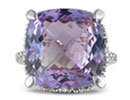 Come on fashionistas and big gemstone lovers.  You will not believe this amazing amethyst ring.  Its so crazy big!  Crafted in sterling silver and featuring an enormous 11 carat amethyst and a few sparkly diamonds.  Diamond content is .04 carat in J/K color and I2 clarity.  One star diamonds.