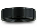 This stunning black titanium ring has the perfect masculine edge.  It is all high polish with a matte finish raised center. All bands at Superjeweler.com are scratch proof and will forever keep its shine. All of our titanium rings are cobalt free and hypoallergenic. Titanium at Superjeweler.com will not cause skin irritations. Due to the hardness of titanium, these rings can be laser engraved, but not hand engraved. All rings come with a 100% Money Back Guarantee.
