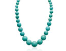 This simple and elegant turquoise graduated hand knotted beadeded necklace is the perfect everday accessory.  This is not a small and dainty turquoise necklace.  The center bead is a whopping 18 millimeters in diameter!  This turquoise necklace is 18 inches long and has a lobster claw clasp.